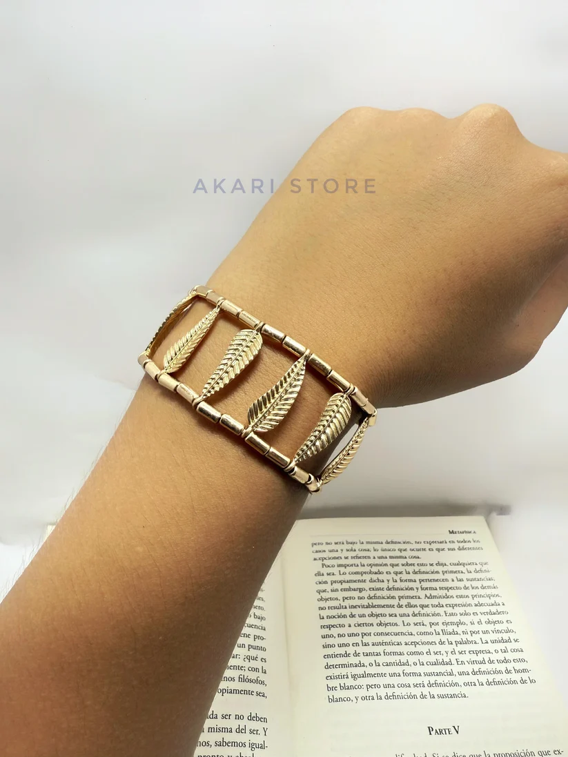 Brazalete con pluma y cuencas metálicas (Azul)